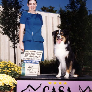Cody finishing his ASCA CDX at the 2001 ASCA Nationals in Greeley, CO, September 18, 2001. Photo Credit Jan Kohler

