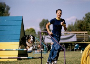 Abbi competing in agility with Emily  